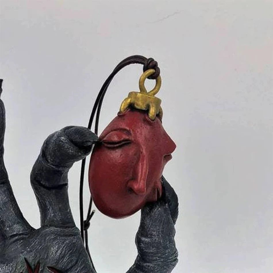 The Egg of the perfect world and Hand of God Statue