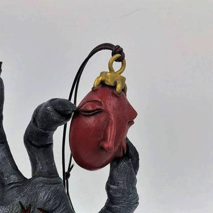 The Egg of the perfect world and Hand of God Statue